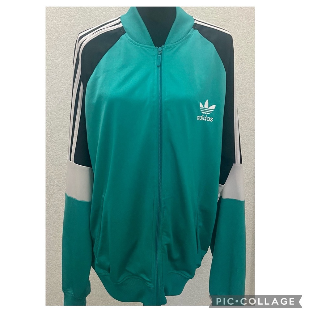 Mens XL Adidas light jacket with original Adidas logo. Like new condition